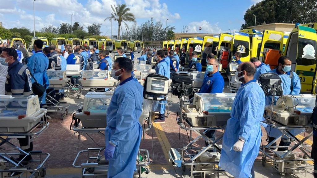 Egyptian medics stand by with incubators to receive premature Palestinian babies evacuated from Gaza on the Egyptian side of the Rafah border crossing with the Gaza Strip, on November 20, 2023,