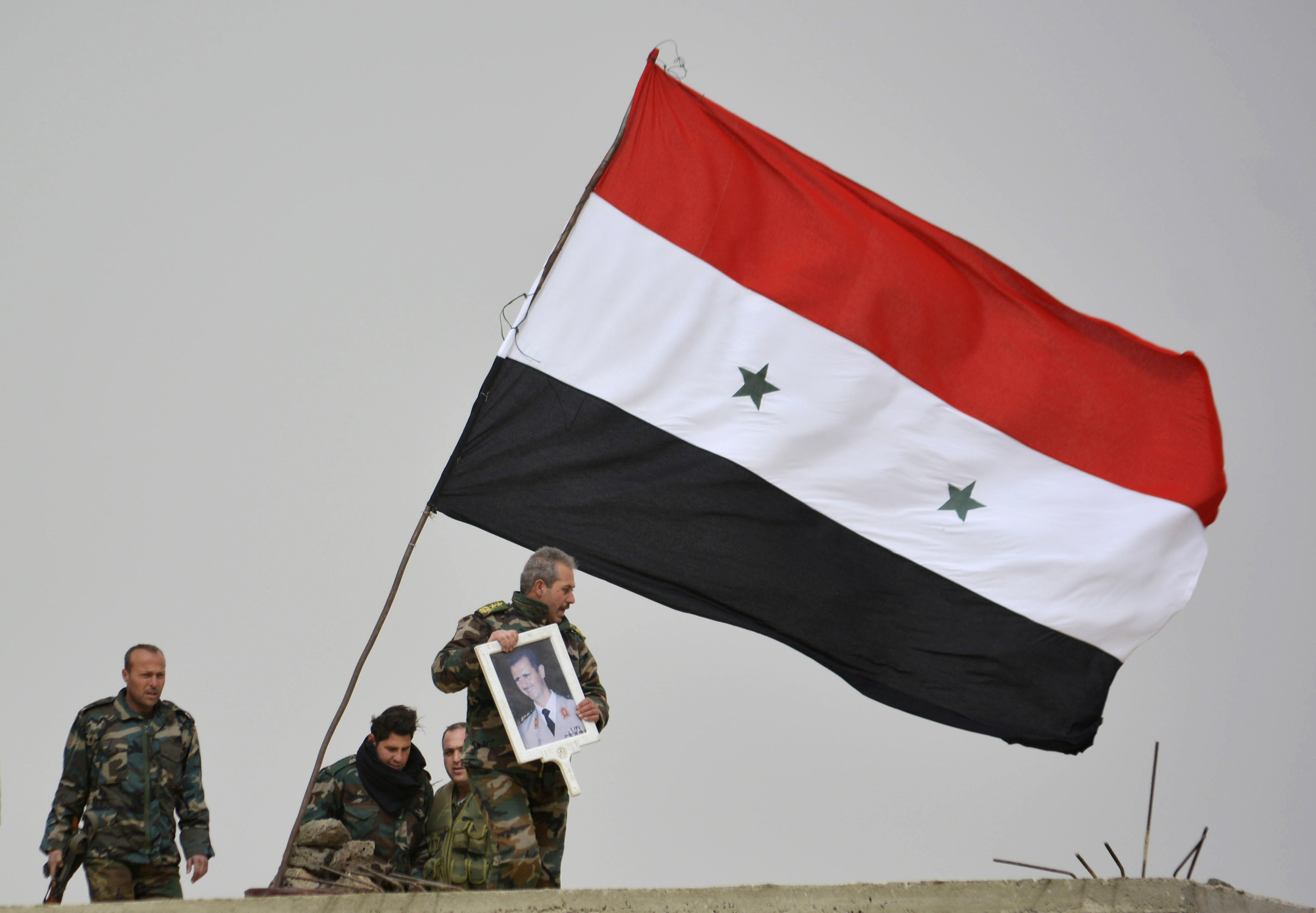 Syrian government raises flag in Deraa, birthplace of revolt