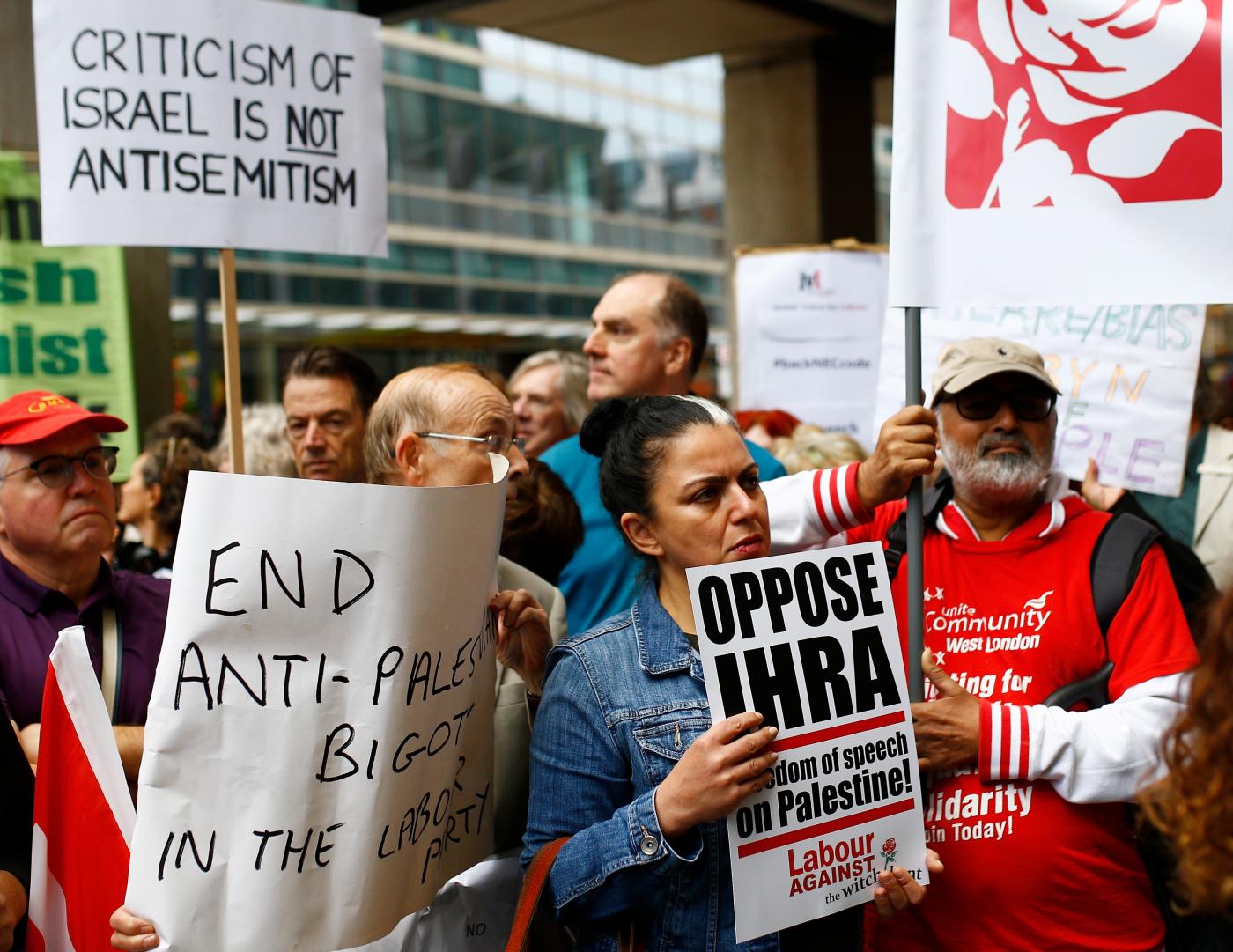 Demonstrators take part in protests outside a meeting of the national executive of Britain's Labour Party as it discussed the party's definition of antisemitism, in London on 4 September 2018 (Reuters)
