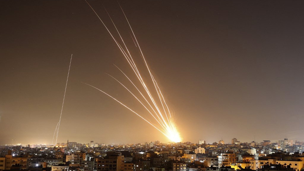 Rockets are fired from Gaza City towards Israel on 10 May 2023 (AFP)