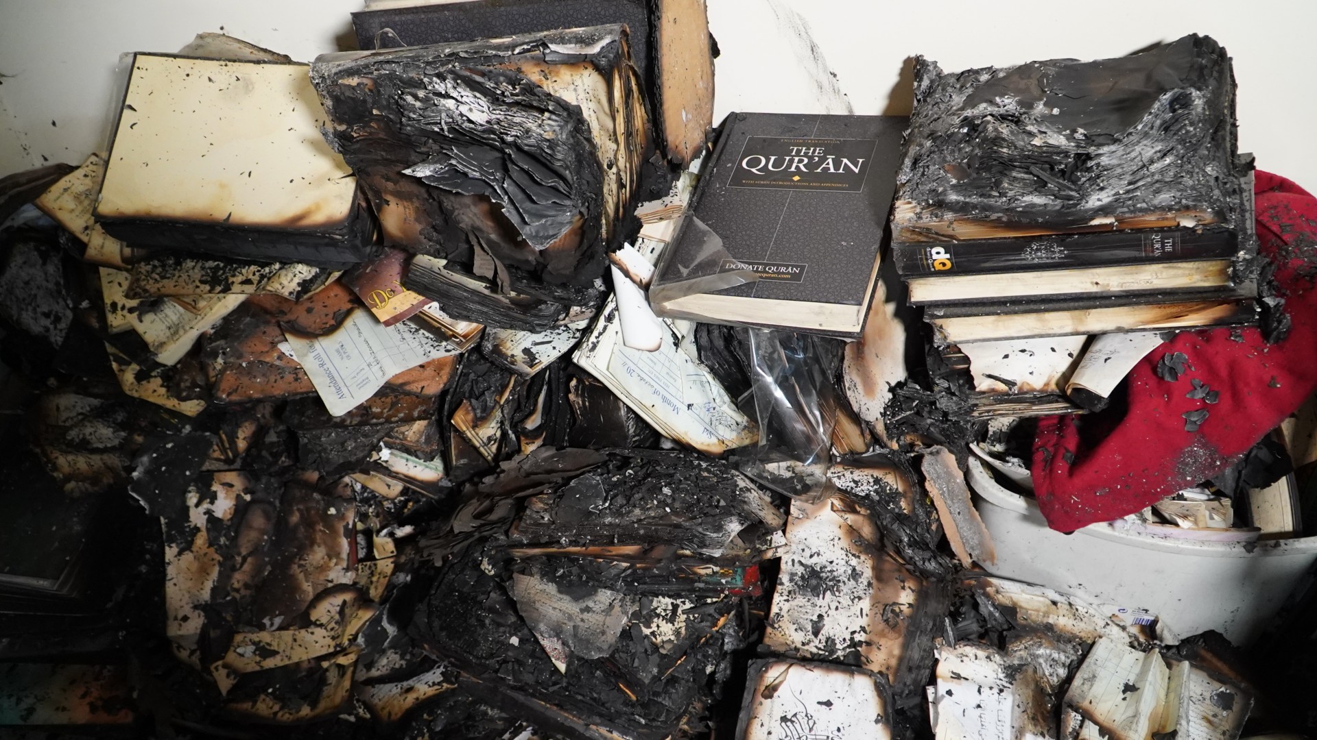 The Muslim community in West London is in a state of shock after the centre was broken into and Quran's set ablaze (MEE/Khaled Shalaby)