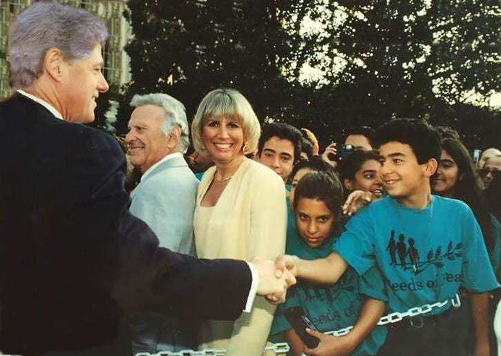 Firas Hashem Ashayer, then aged 13, shakes hands with US President Bill Clinton after the signing of the Oslo Accords in 1993 (Supplied)