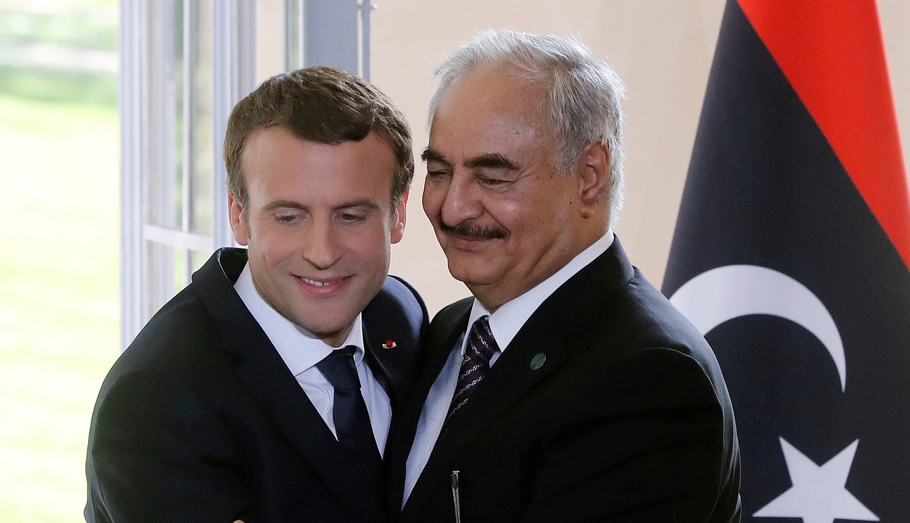 French President Emmanuel Macron and General Khalifa Haftar (AFP)