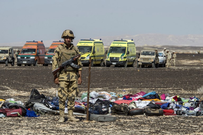An Egyptian army soldier stands guard after the downing of a Russian airliner in Sinai in November 2015 (AFP)