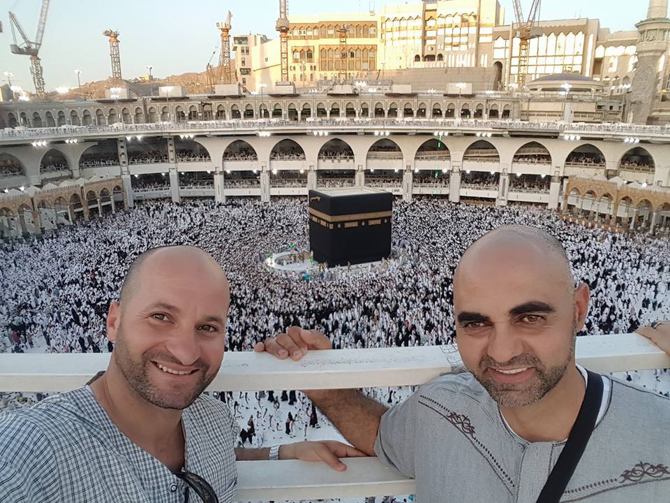 Nihad Zughair (L) pictured in the Grand Mosque in Saudi Arabia's holy city of Mecca during his last trip in 2017. (Provided)
