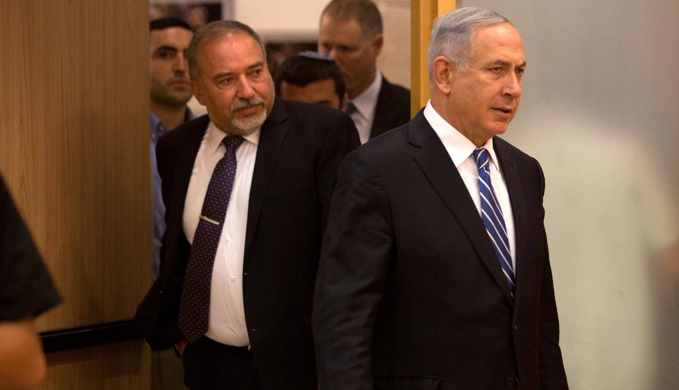 One-time allies Avigdor Lieberman, left, and Benjamin Netanyahu back in 2016 (AFP)