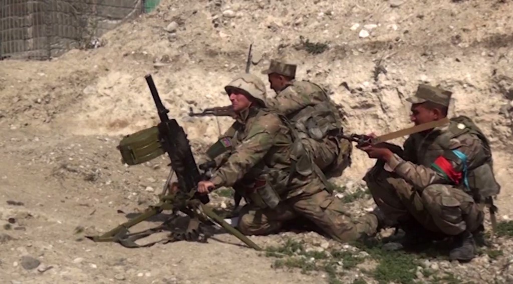 A video grab from 28 September allegedly shows Azeri troops conducting a combat operation in Nagorno-Karabakh (Azerbaijani Defence Ministry/AFP)