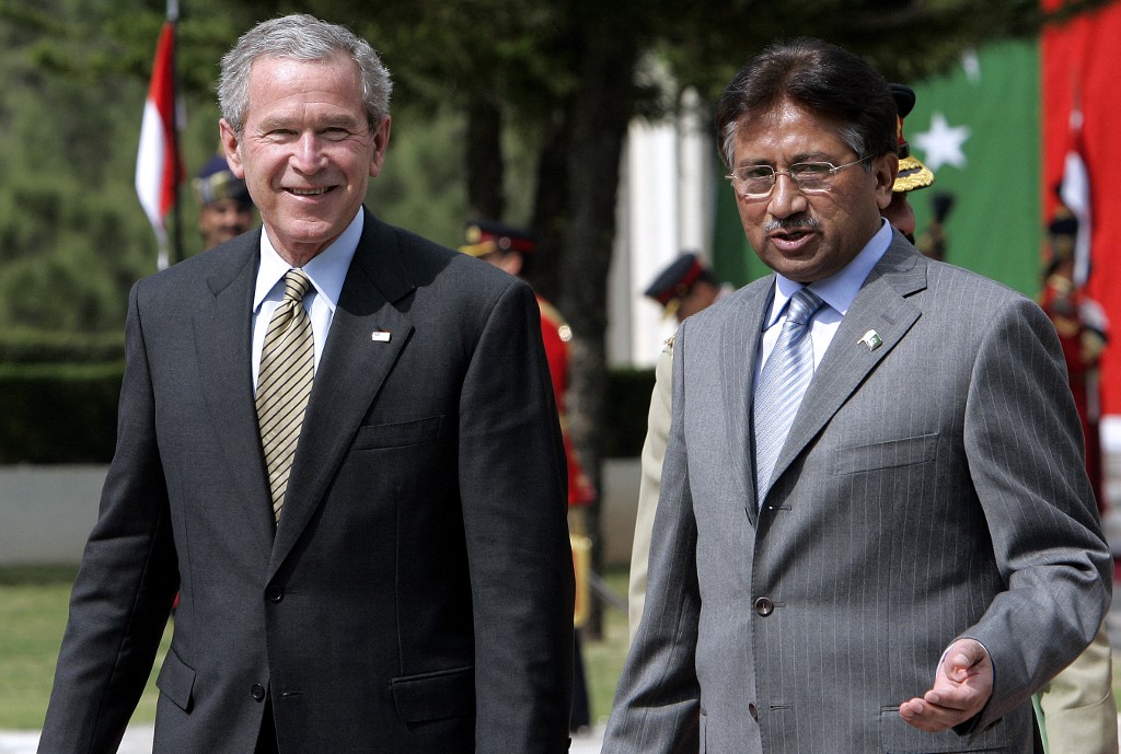 Then-US President George W Bush walks with then-Pakistani President Pervez Musharraf in Islamabad in March 2006 (AFP)