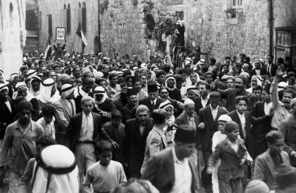 A picture dated before 1937 shows Arabs demonstrating in Jerusalem against Jewish immigration to Palestine (AFP)