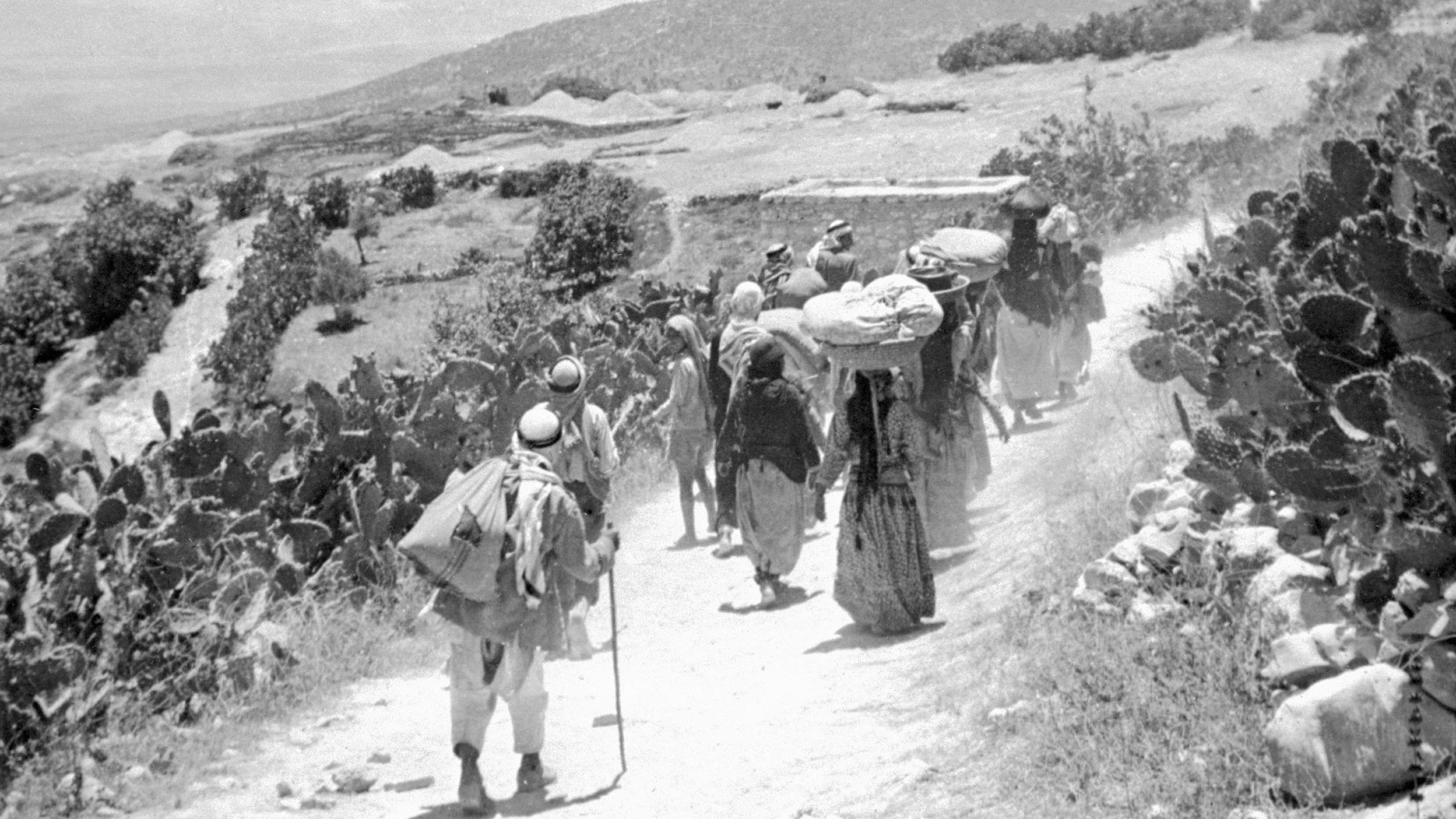  In this file photo released on September 15, 1948, Palestinian refugees return to their village after its surrender during the 1948 Arab war against the proclamation of the Israeli State.