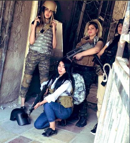 Four Iraqi women pose in PUBG clothes to protest ban (Twitter)