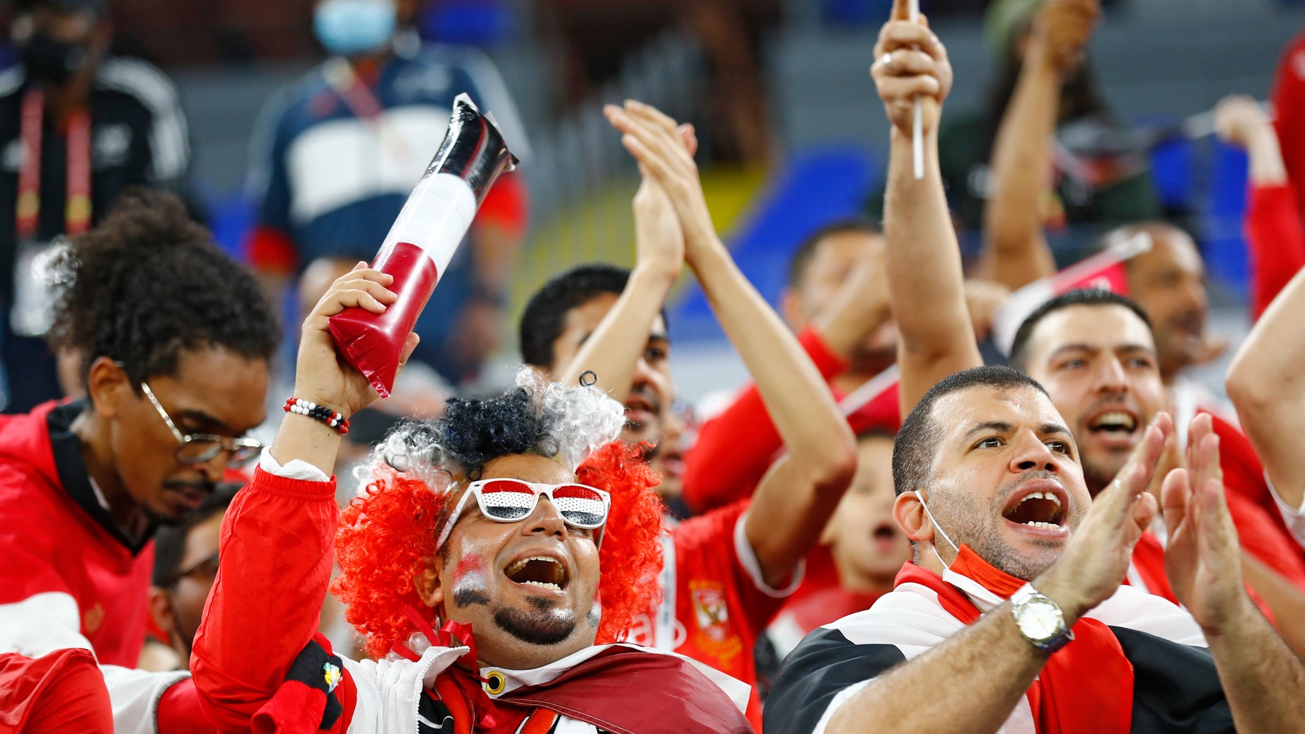 Egypt's supporters cheer ahead of the FIFA Arab Cup 2021 semi-final football match between Tunisia and Egypt at the 974 stadium in the Qatari capital of Doha on December 15, 2021.