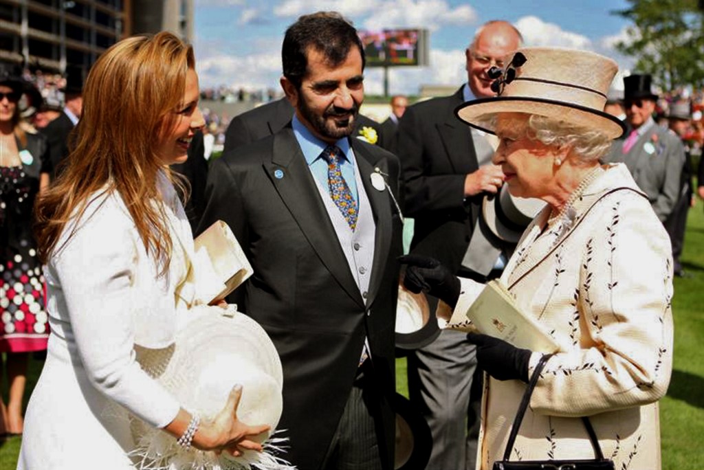 Sheikh Mohammed bin Rashid al-Maktoum and Princess Haya meet Queen Elizabeth II on the first day of the Royal Ascot in 2008 (AFP)