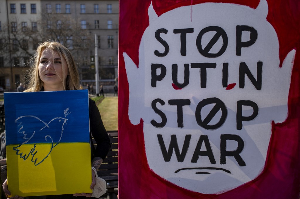 Members of Prague’s Russian community denounce the war on 26 March 2022 (AFP)
