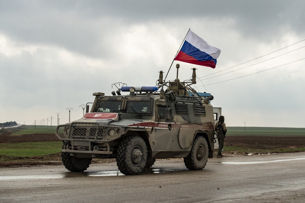 A Russian military vehicle patrols Syria’s Hasakah province in February 2020 (AFP)