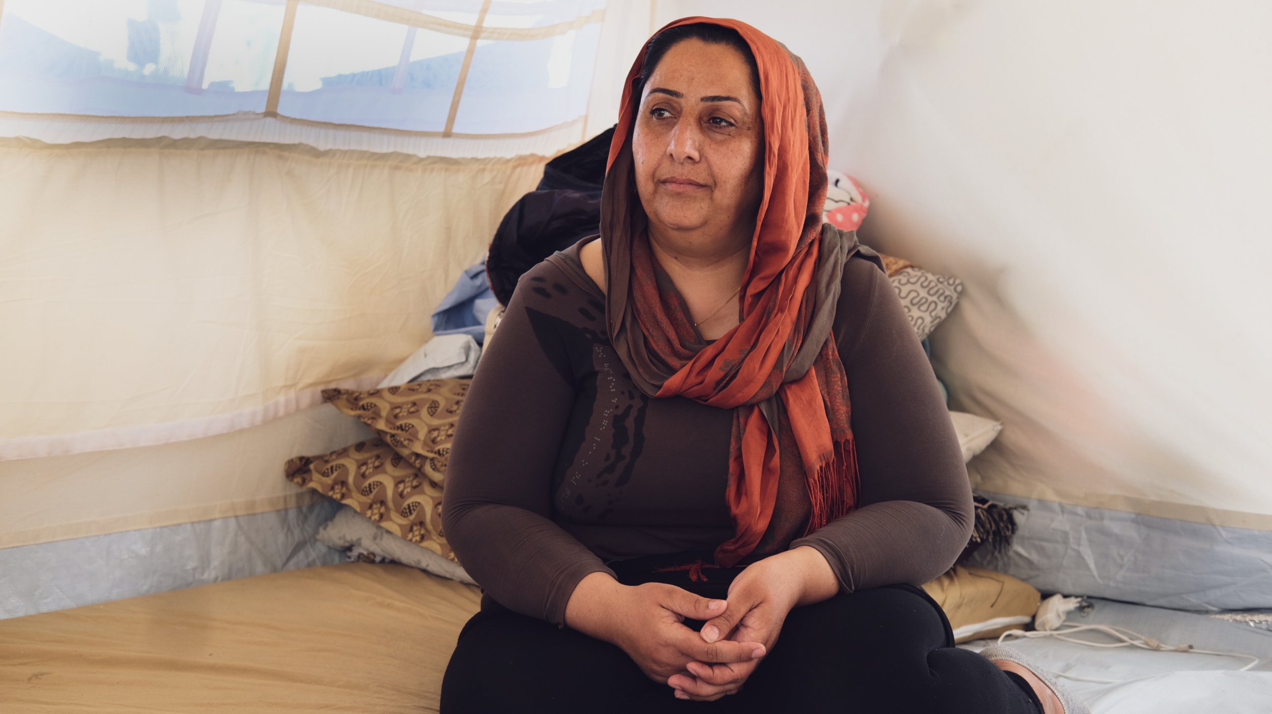 Sanaa Muhammed, from Qamishli, sold all her jewellery to afford the cost of a smuggler (MEE/Elizabeth Hagedorn)