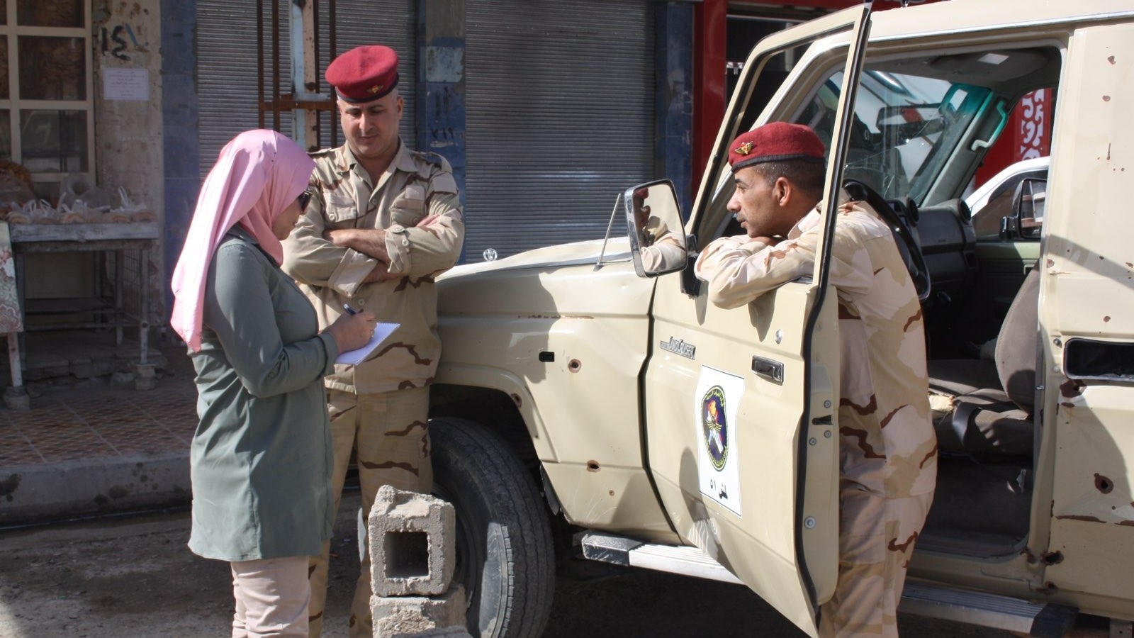 Suadad al-Salhy interviews security forces in Fallujah in 2018 (MEE)