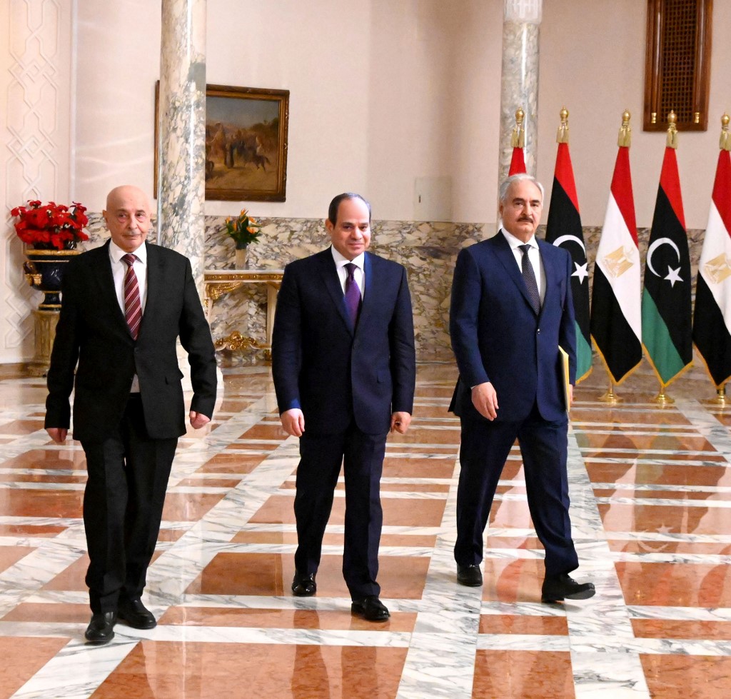 Sisi, Libyan commander Khalifa Haftar and Libyan parliament speaker Aguila Saleh arrive for a joint news conference in Cairo on 6 June (Egyptian Presidency/AFP)