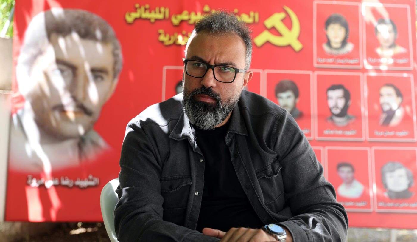 Together Towards Change Lebanese candidate Ayman Mroueh speaks to MEE from the headquarters of the Lebanese Communist Party in Zrariyeh, south Lebanon (MEE/Hasan Shaaban)