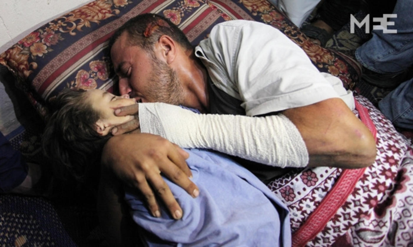 Gaza father's cry of grief: 'Wake up baby.