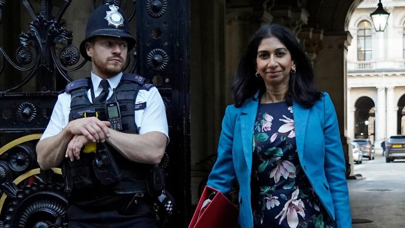 Britain's Home Secretary Suella Braverman (R) arrives the attend the first cabinet meeting under the new Prime Minister, Rishi Sunak at 10 Downing Street in central London on October 26, 2022 (AFP)