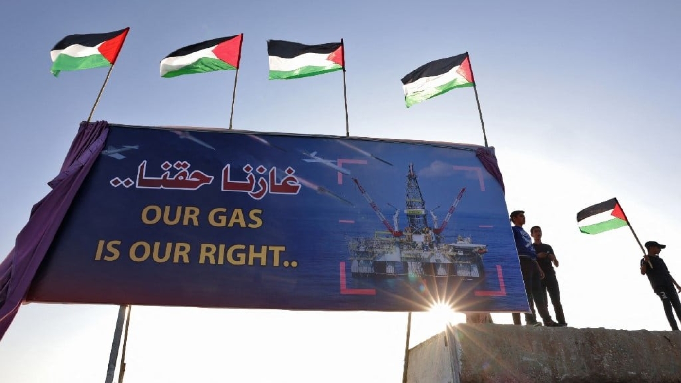 Palestinians join in a rally at the Gaza City sea port on 14 September 2022 to demand their right to receive gas from maritime fields in the eastern Mediterranean (AFP)