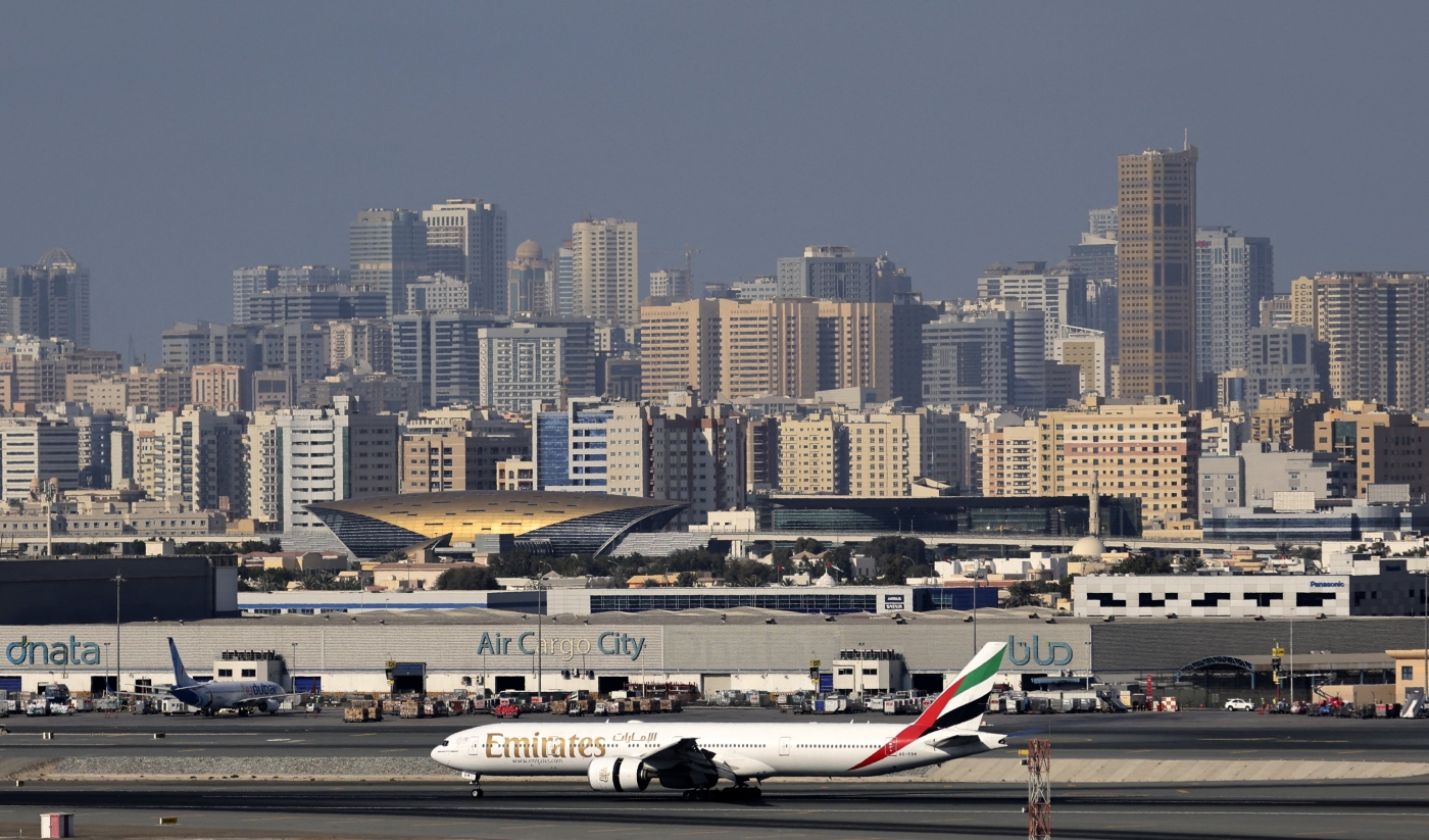 Aviation networks, infrastructure and laissez-faire policies have helped the Gulf city become the business hub of the Middle East and Africa. Dubai International Airport, 1 February, 2021. (Karim Sahib/AFP)
