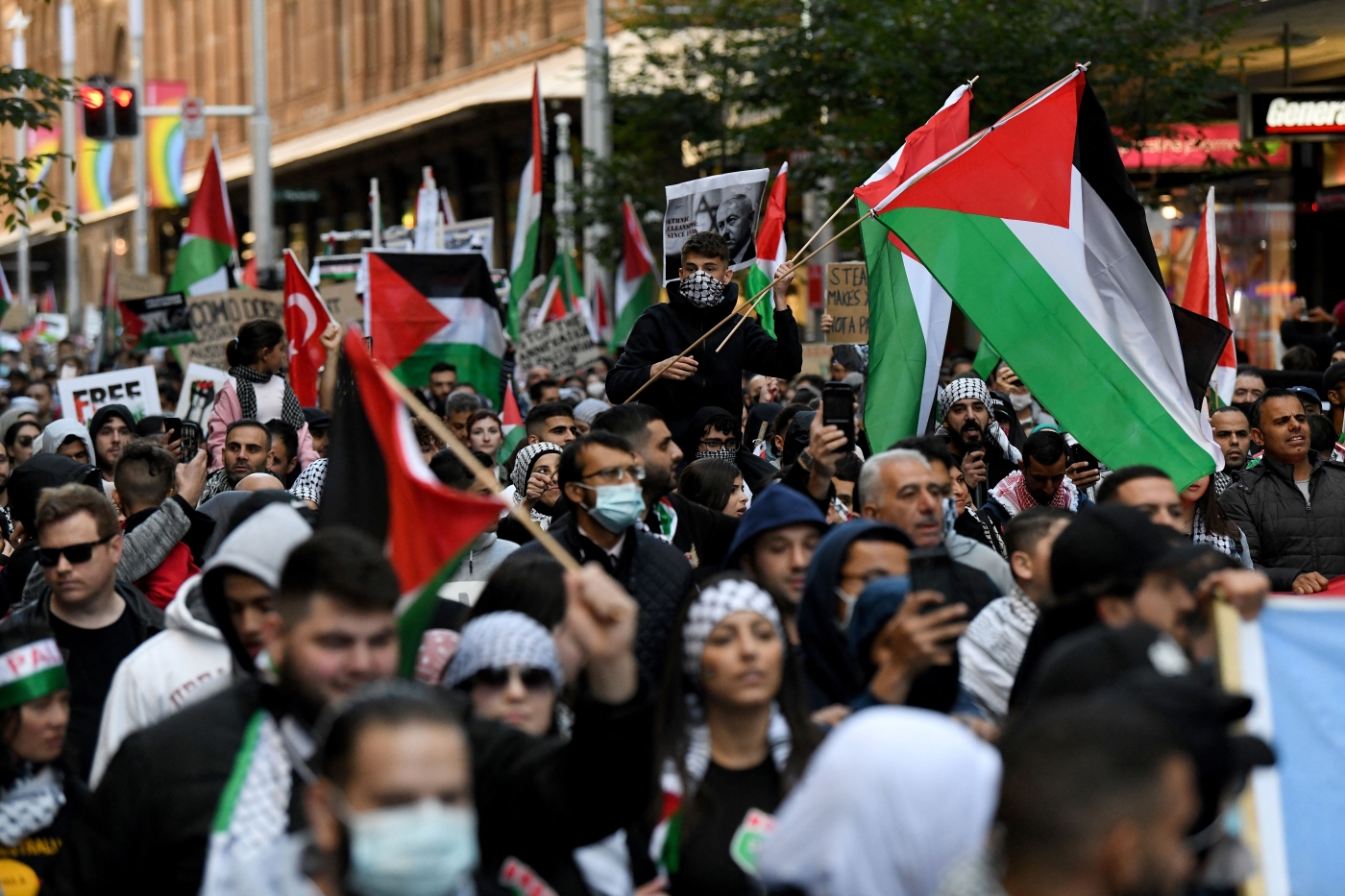 Protesters wave Palestinian flags in Sydney