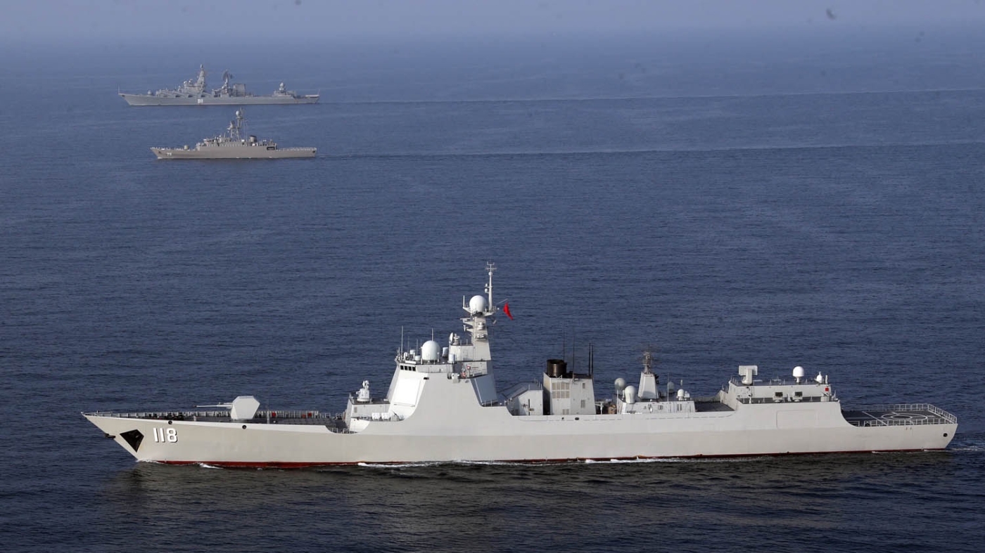 A handout picture made available by the Iranian Army official website on 21 January 2022 shows Iranian, Russia and Chinese warships during a joint military drill in the Indian Ocean.