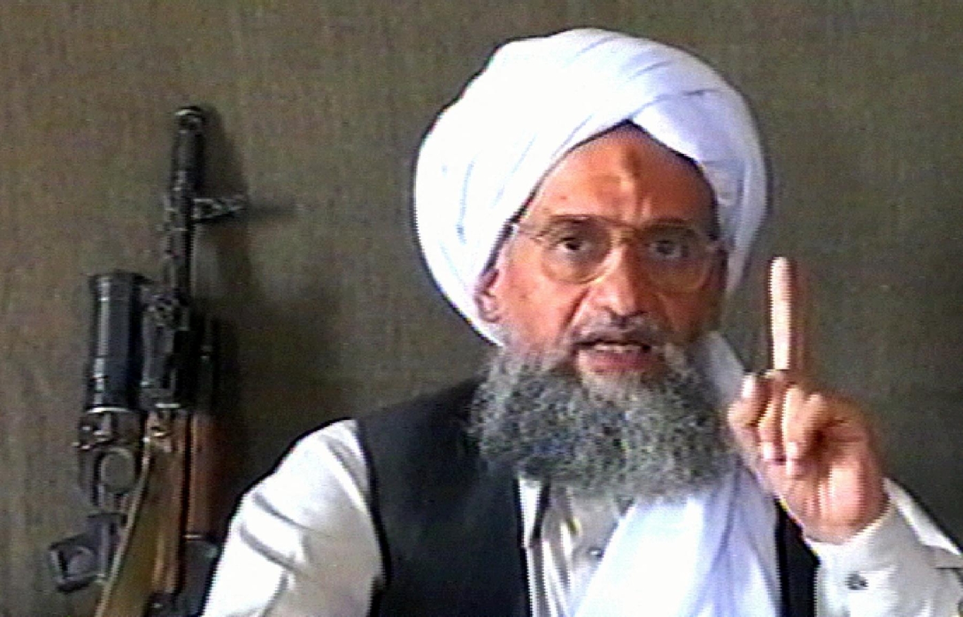 A TV grab taken 17 June 2005 from Qatar-based Al-Jazeera news channel shows Ayman al-Zawahiri delivering a speech with a machine gun next to him (AFP)