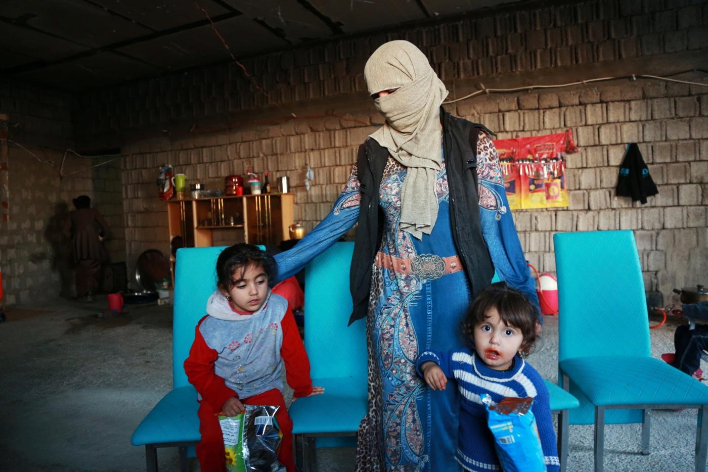 Une yézidie et ses enfants enlevées par l’État islamique mais ayant réussi à s’enfuir. Contrairement aux yézidies, aucun effort particulier n’a été déployé pour libérer les Turkmènes chiites (Reuters)
