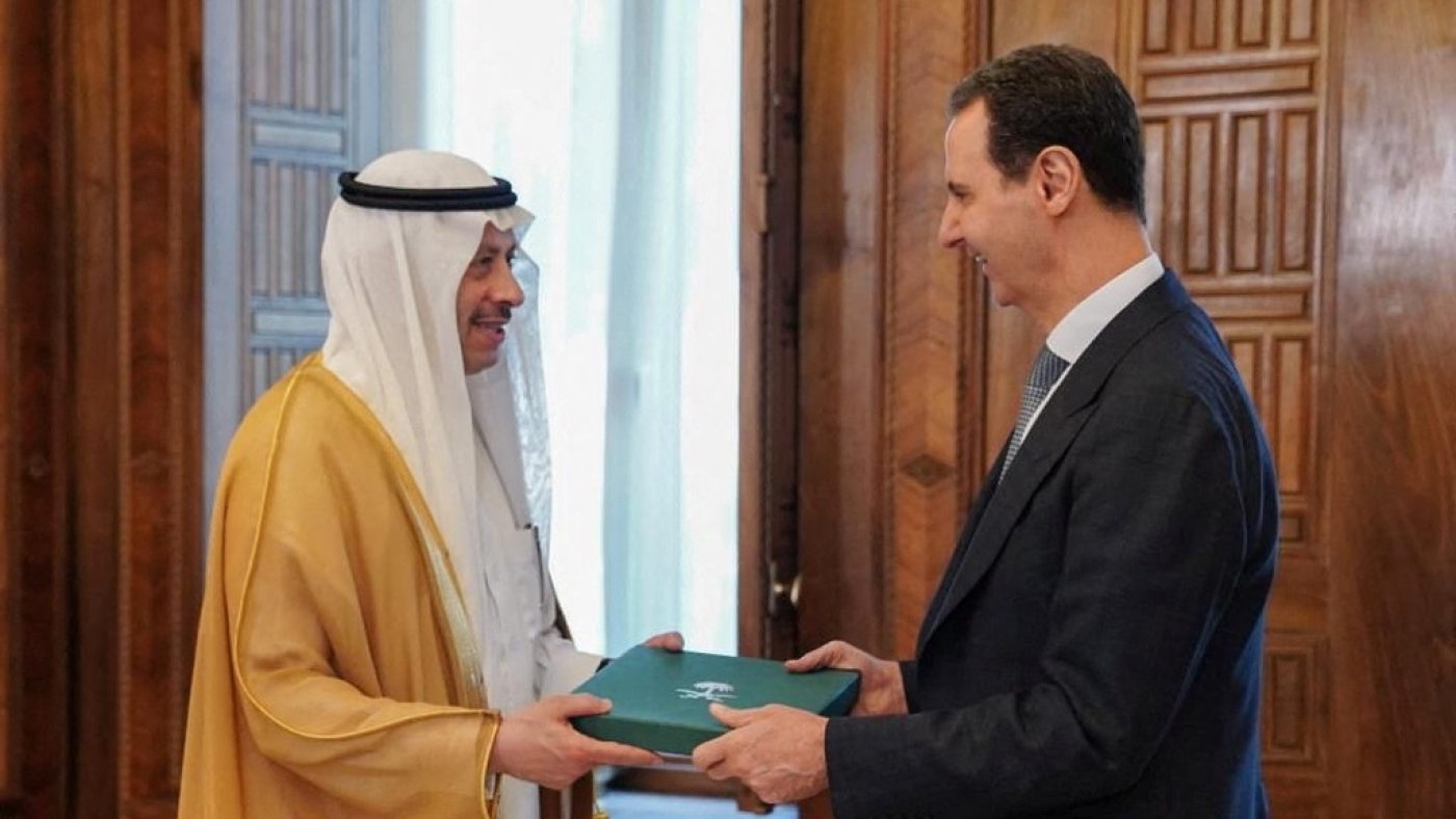 Syria's President Bashar al-Assad receives an invitation through Saudi Ambassador to Jordan Naif bin Bandar Al-Sudairi to attend the Arab League summit, in Damascus 10 May (Reuters)
