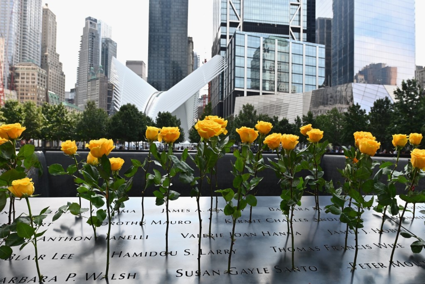 Flowers placed at the 9/11 Memorial & Museum in New York on 11 September 2020