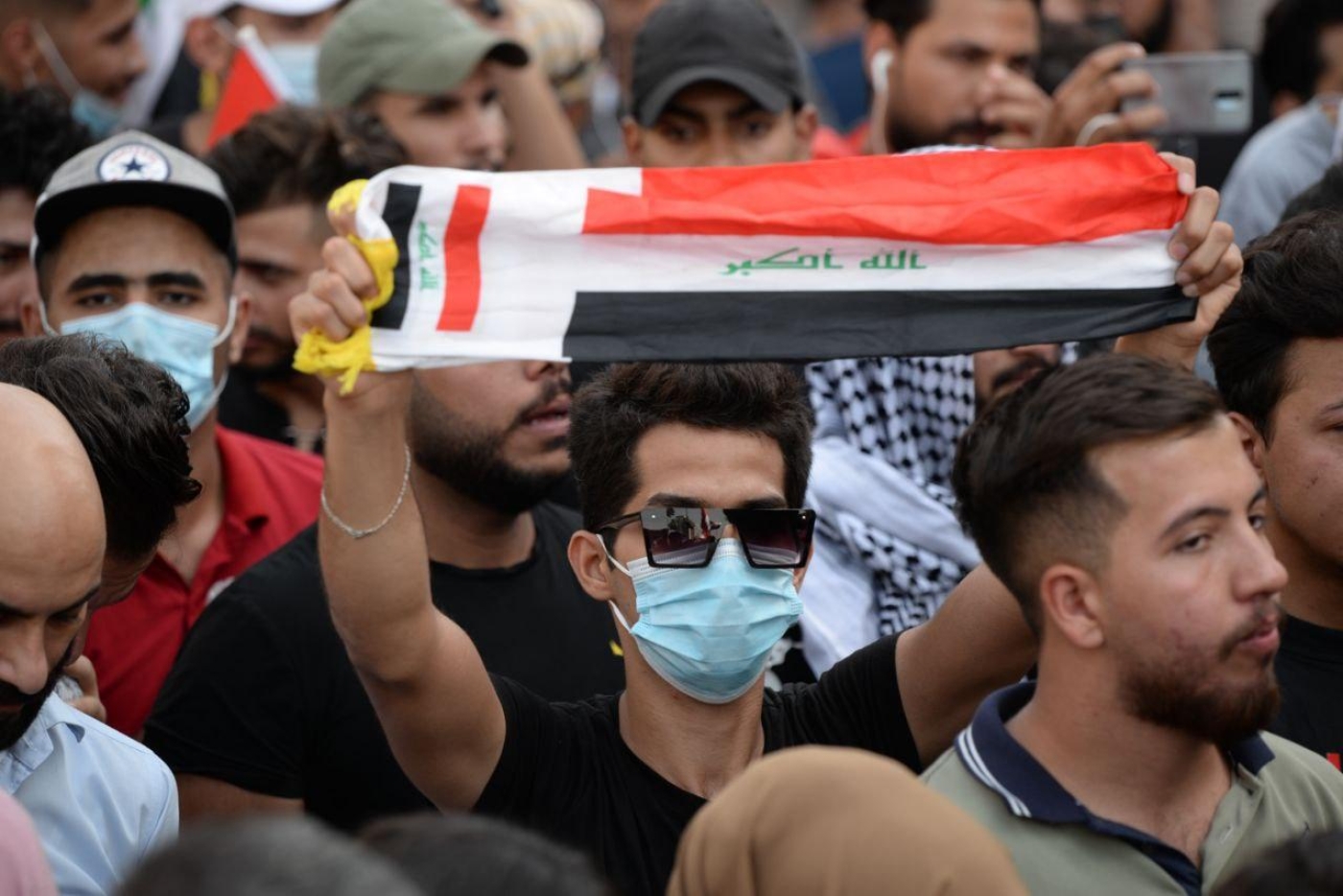 Protesters poured into Tahrir Square to commemorate the first anniversary of Iraq's demonstration.