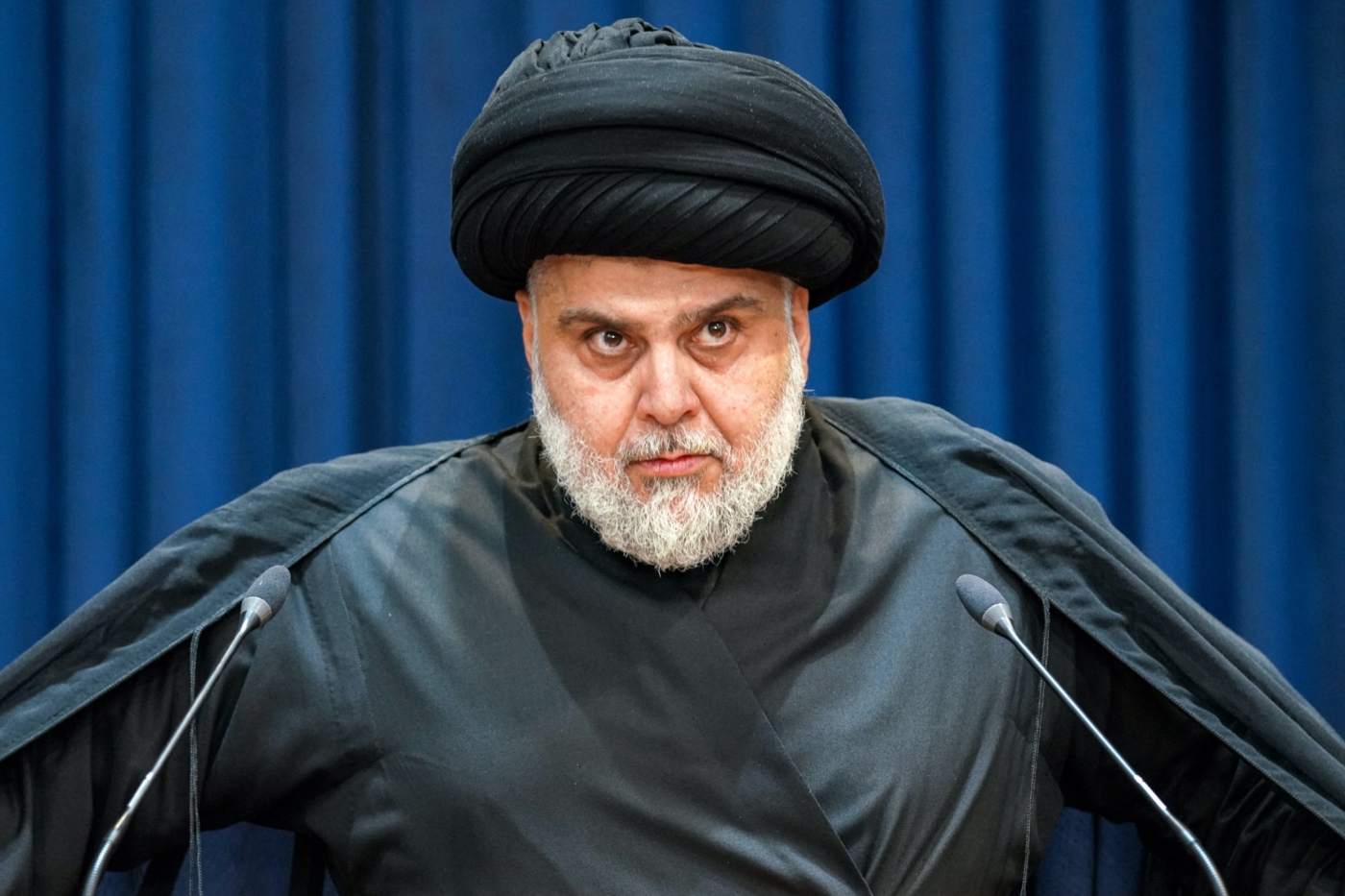 Shia cleric Muqtada Sadr gives a speech in Iraq's central holy shrine city of Najaf on 30 August 2022 (AFP)