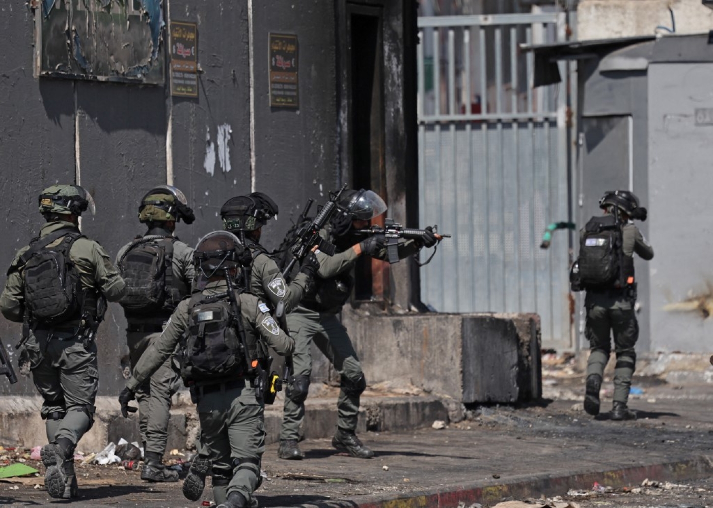 Israeli security forces raid the Palestinian Shuafat refugee camp in Israeli-annexed East Jerusalem, 10 October 2022 (AFP)