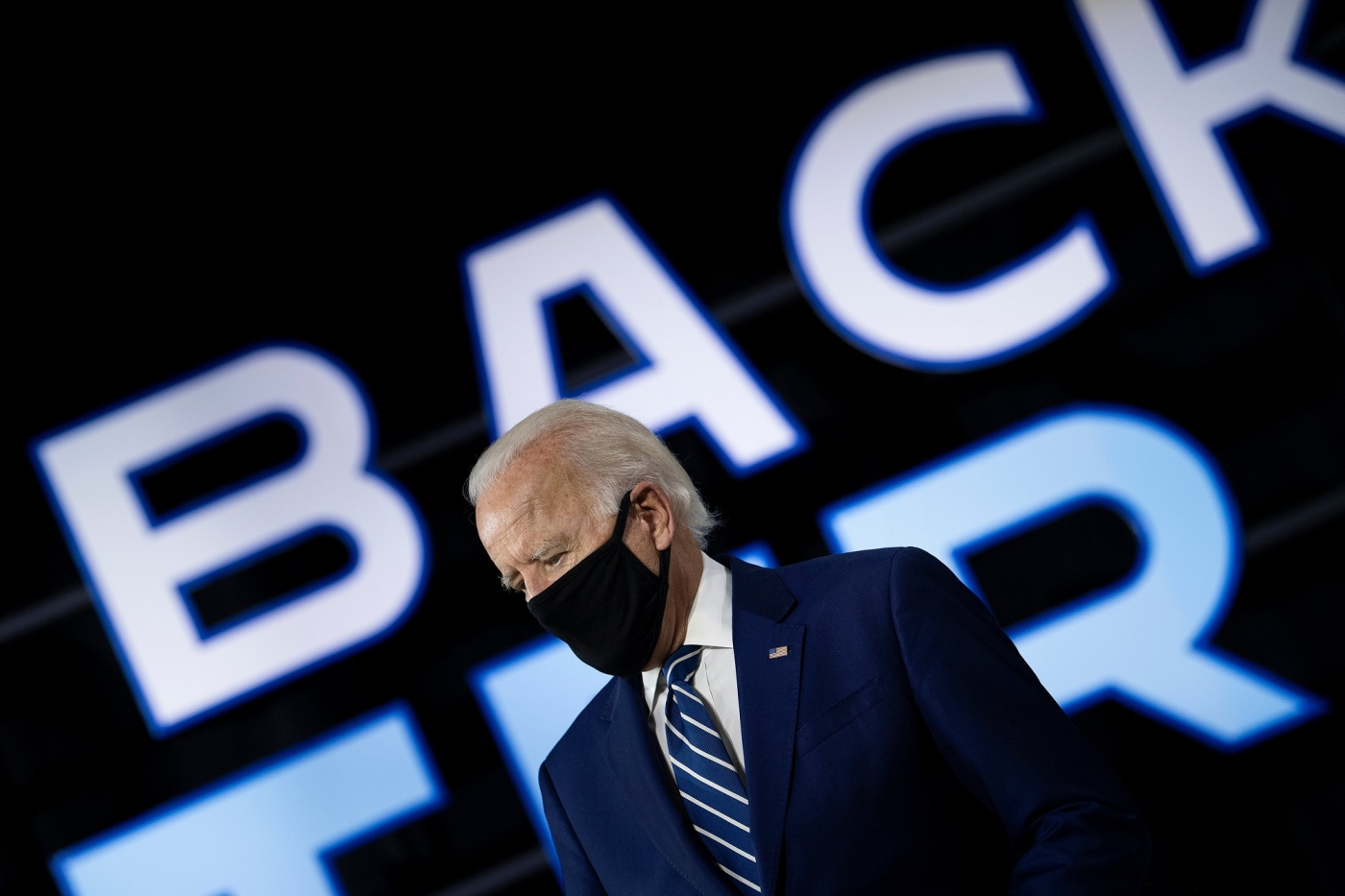 Joe Biden, wearing a black mask