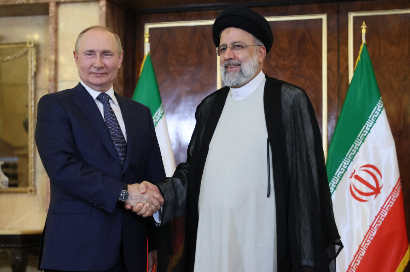 Vladimir Putin and Iran's President Ebrahim Raisi 
