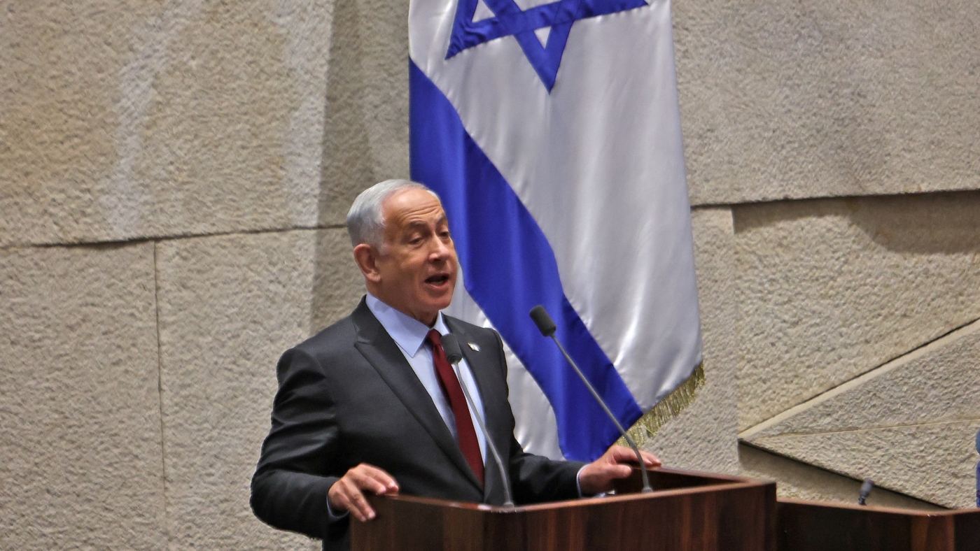 Israeli prime minister-designate Benjamin Netanyahu speaks at the Knesset in Jerusalem on 13 December 2022 (AFP)
