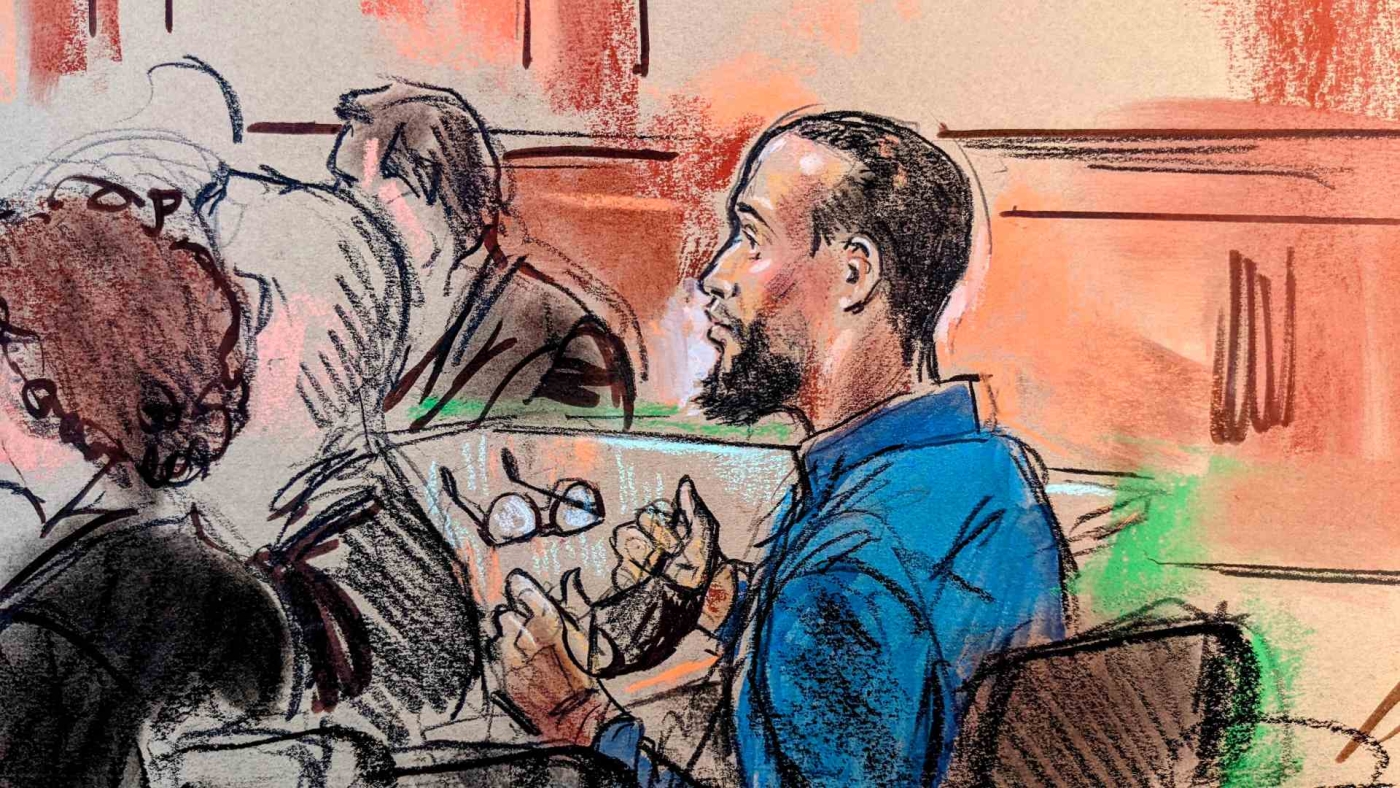 El Shafee Elsheikh, accused of lethal hostage-taking and conspiracy to commit murder as an alleged member of an Islamic State cell nicknamed "the Beatles", at his trial in Alexandria, Virginia on 1 April 2022.
