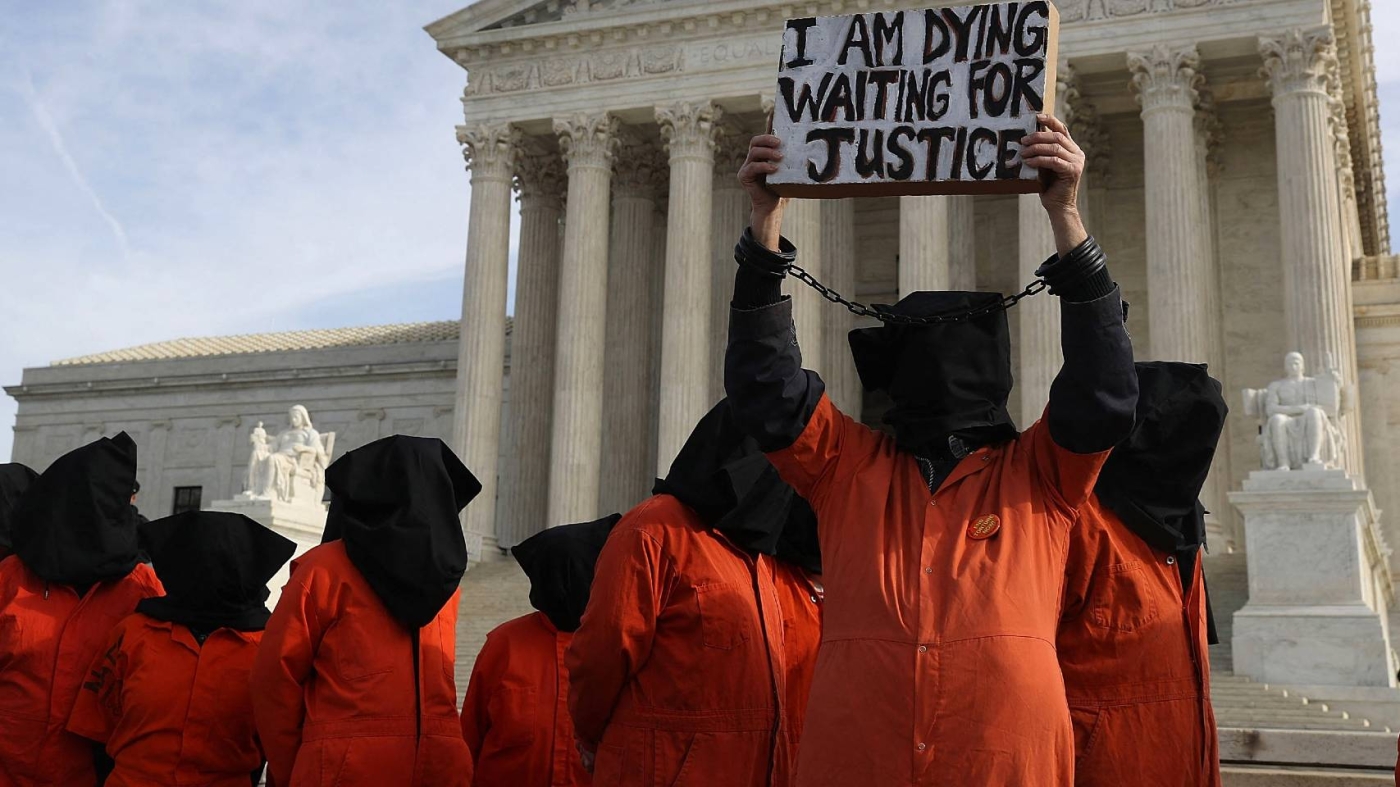 Protesters gather in front of the US Supreme Court to protest the detention facility in Guantanamo Bay, Cuba on 11 January 2017 in Washington.