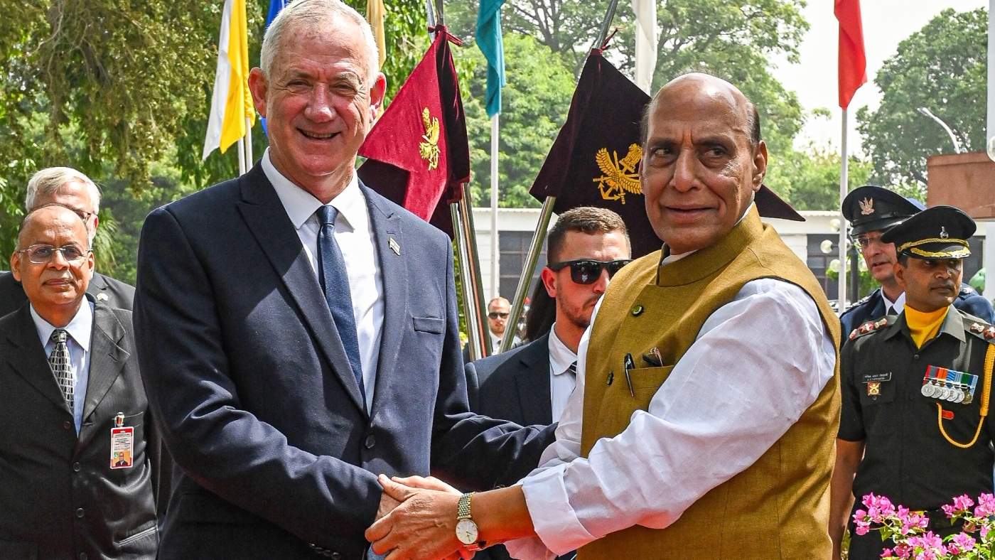Israel's Defence Minister Benny Gantz (L) shakes hands with India's Defence Minister Rajnath Singh as he arrives for a bilateral meeting in New Delhi on 2 June, 2022 (AFP)