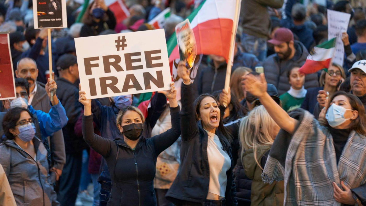People demonstrate against the Iranian government during a protest at Mel Lastman Square in Toronto, Canada, 24 September 2022.