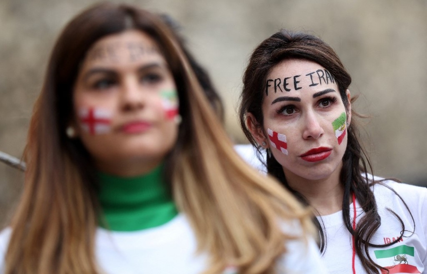 British-Iranian women take part in a demonstration in central London on 19 November 2022 (AFP)