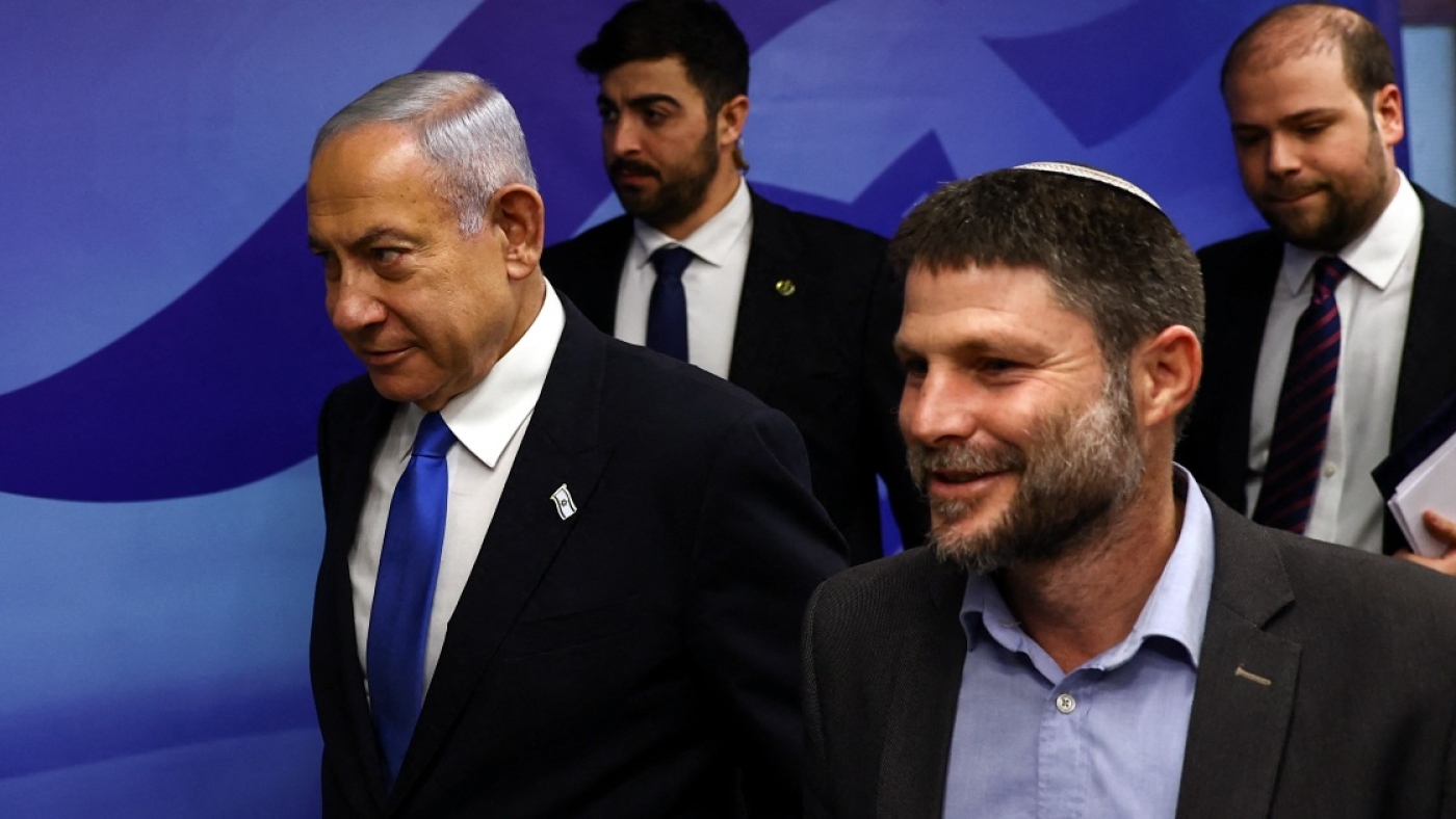 Israeli Prime Minister Benjamin Netanyahu (L) and Finance Minister Bezalel Smotrich arrive to attend a cabinet meeting at the prime minister's office on 23 February 2023.