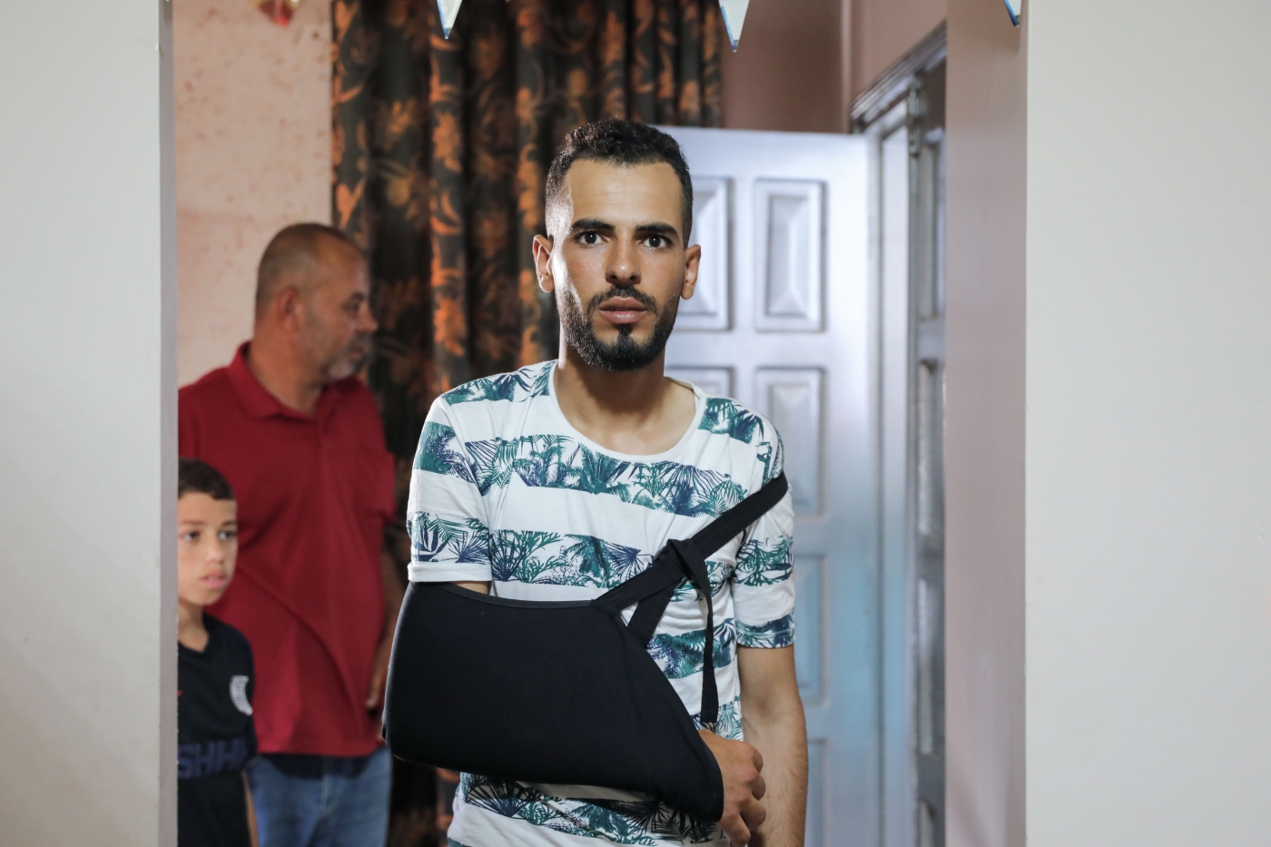 Jaber Bakr was hit in the shoulder with an Israeli rubber-coated bullet while fishing off Gaza's coast on 16 June 2022. (MEE/Mohammed al-Hajjar)