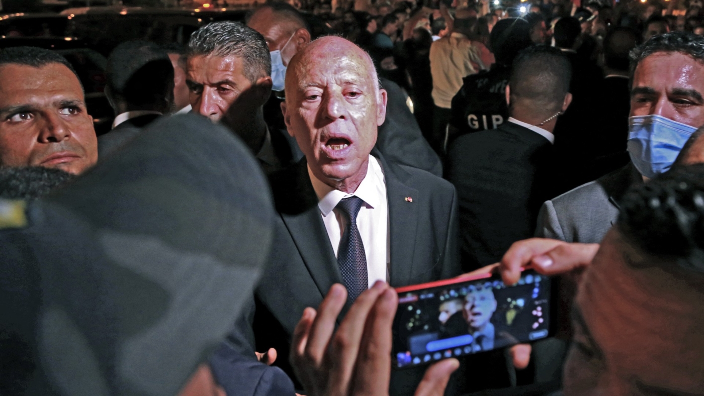 President Kais Saied with his supporters on Habib Bourguiba Avenue in the capital Tunis on 26 July 2022 (AFP)