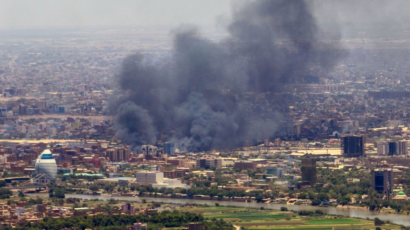 Smoke billows during fighting in the Sudanese capital Khartoum, on 3 May 2023 (AFP)