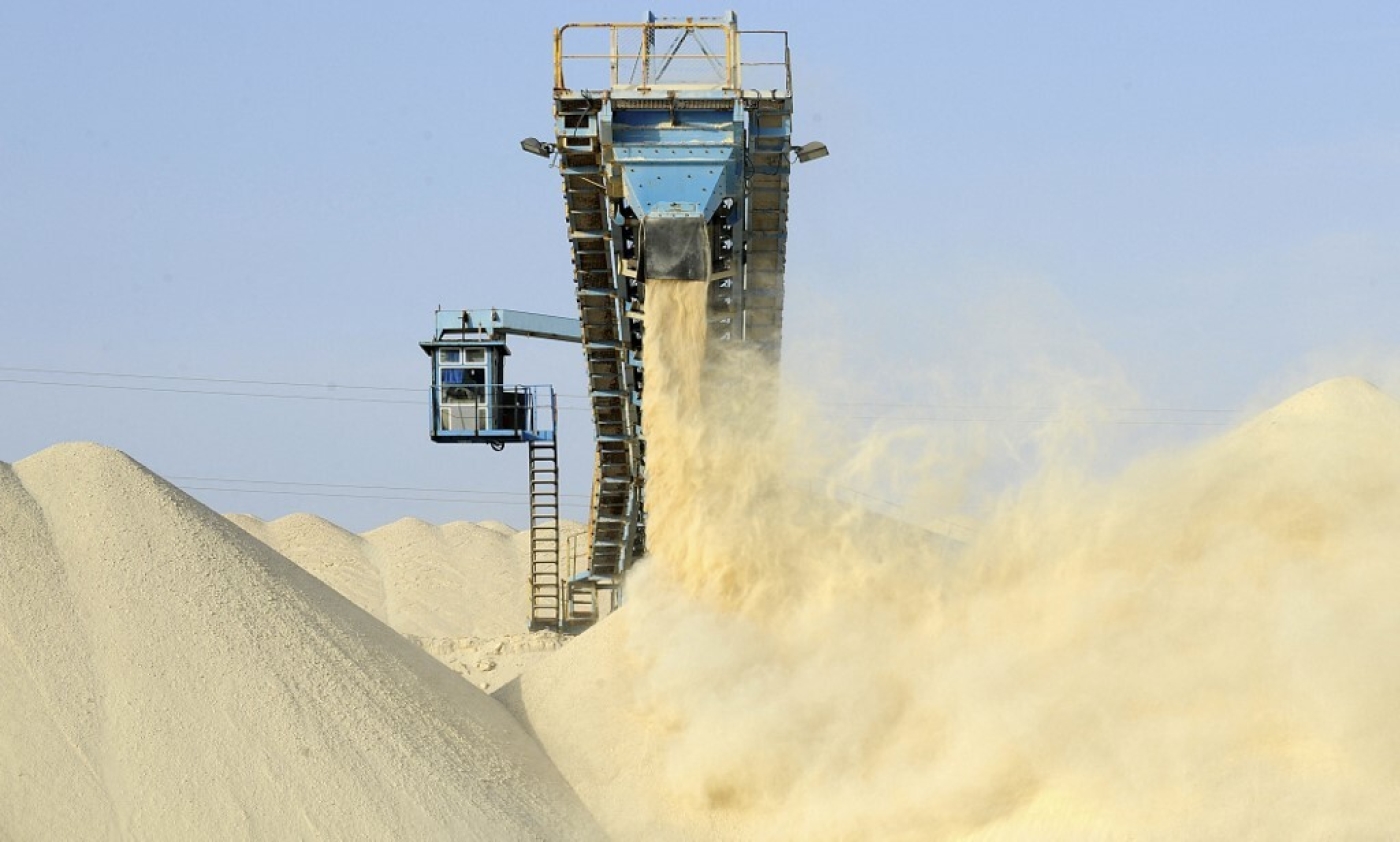 Untreated phosphate being dropped off on 13 May 2013 at the Marca factory of the National Moroccan phosphates company OCP near Laayoune, the capital of Moroccan-controlled Western Sahara. (AFP)