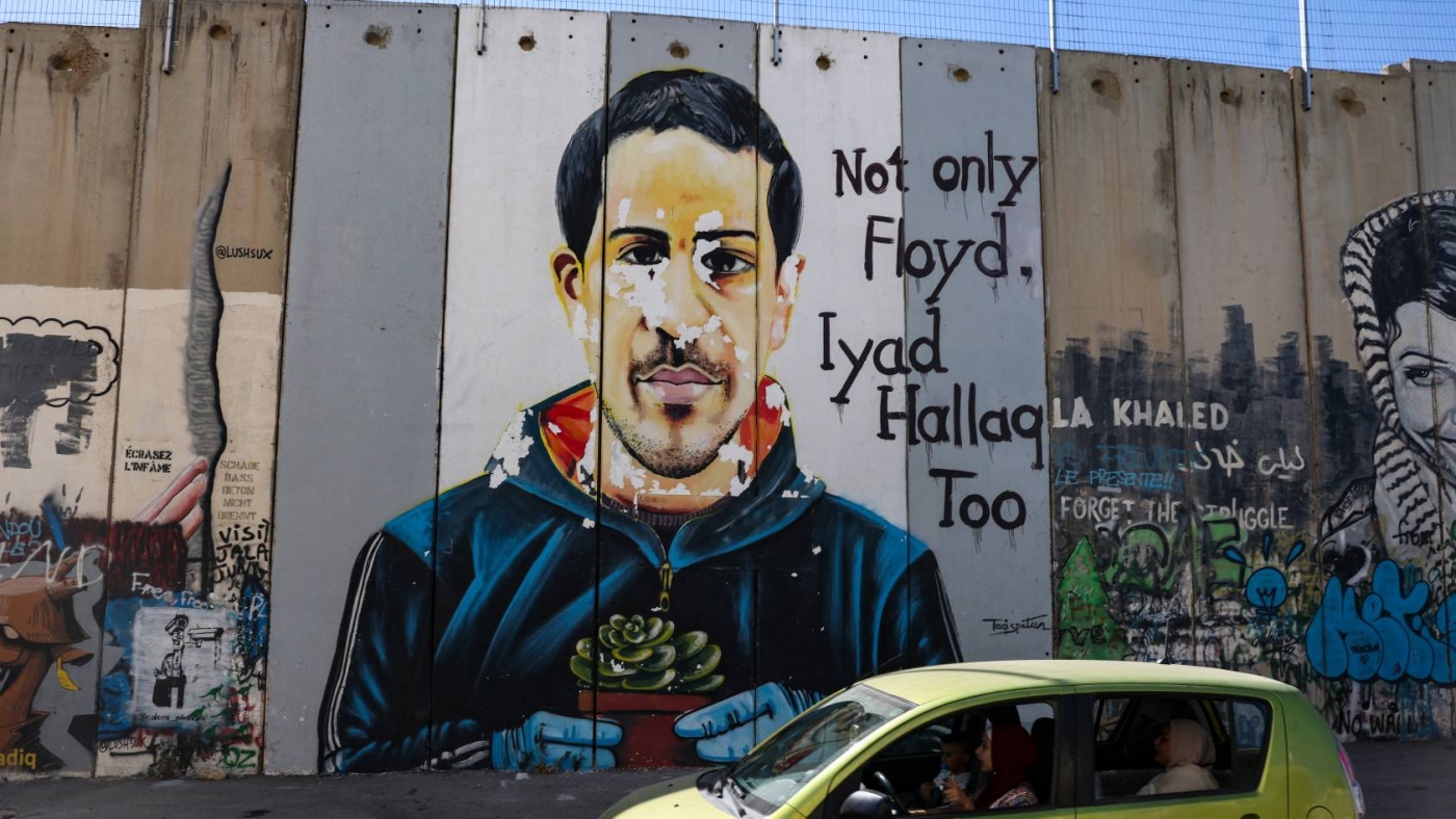 A mural depicting Eyad Halak, a 32-year-old Palestinian man who was shot dead by Israeli police in May 2020 (AFP)